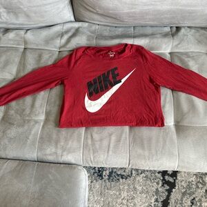 Medium Nike red  dri-fit shirt. Good condition, lightly worn